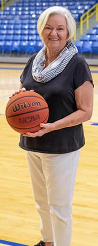 Sharon Amick standing on basketball court
