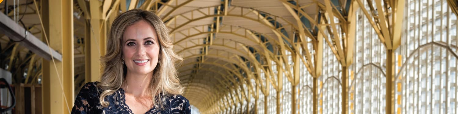 Alumna overlooking an airport terminal