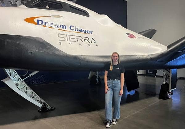 Grace Robertson in front of space plane.