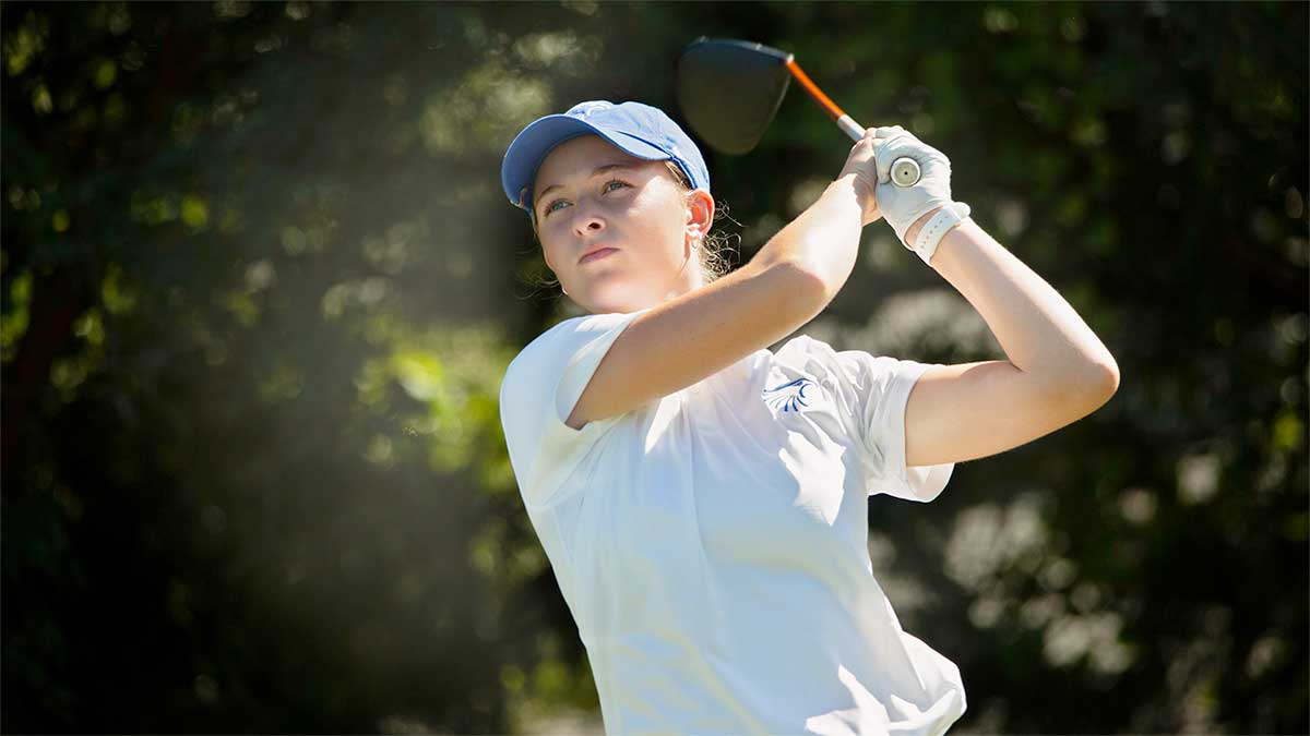 Steve Albright swings a golf club