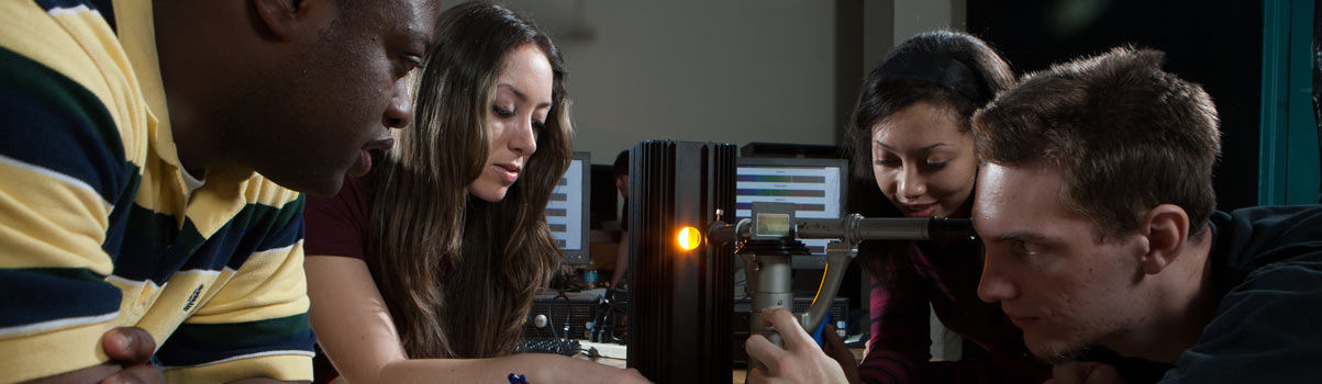a group of students working in a lab