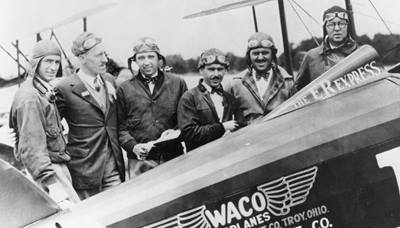 an old photo of ERAU Waco pilots
