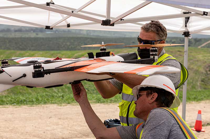 Scott Painter and male employee work on UAS