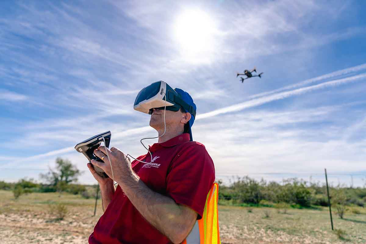 PRofessor uses first person viewing goggles to operate drone