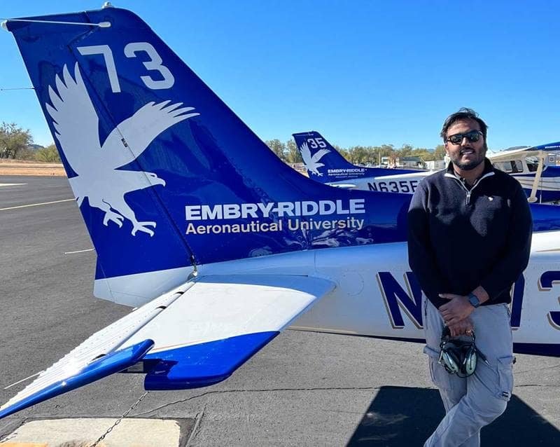 Aditya Rathi stands in front of Cessna