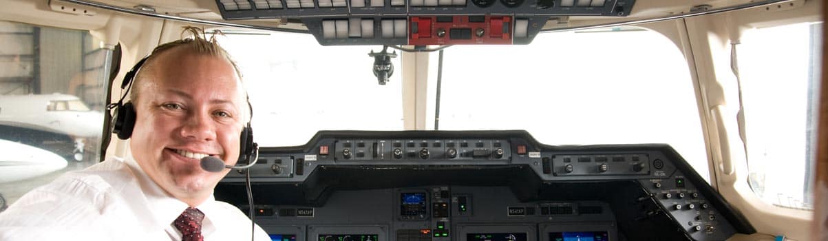 Pilot sits at cockpit of plane